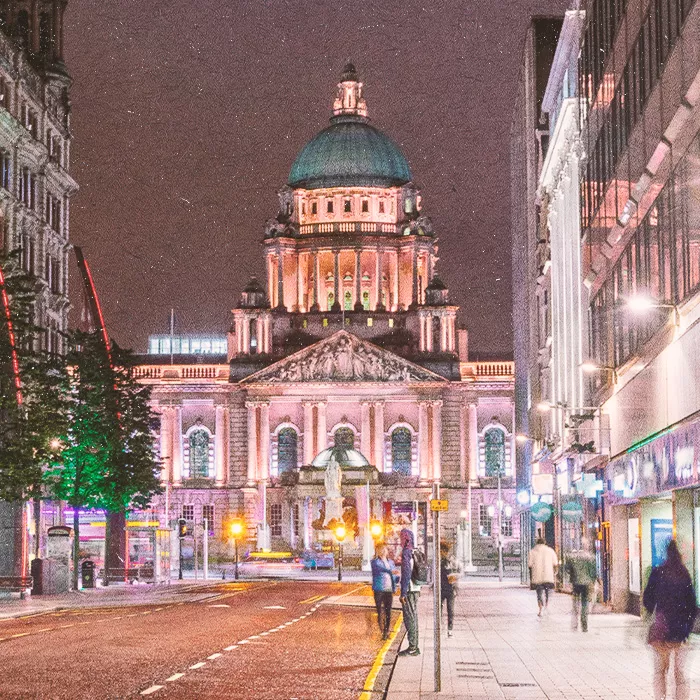 Belfast City Hall in the evening illuminated from the ground