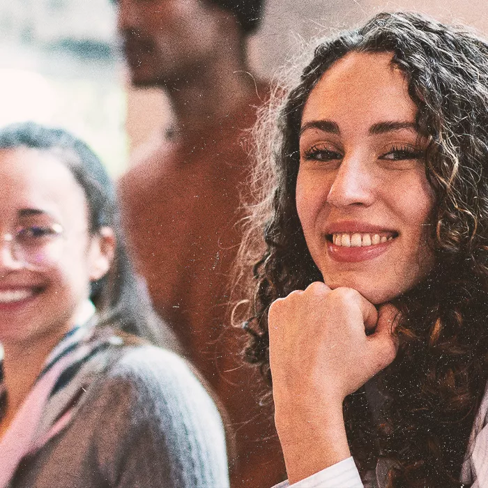 Woman turned towards the camera smiling
