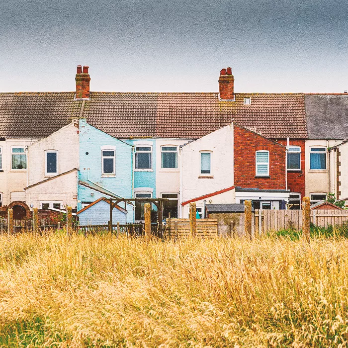Two-story, multi coloured houses from the outside