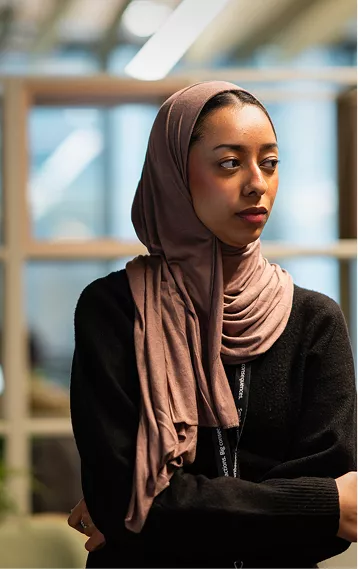 Young muslim woman smiling towards the camera
