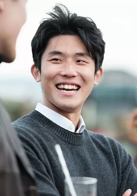 Young man smiling towards the camera