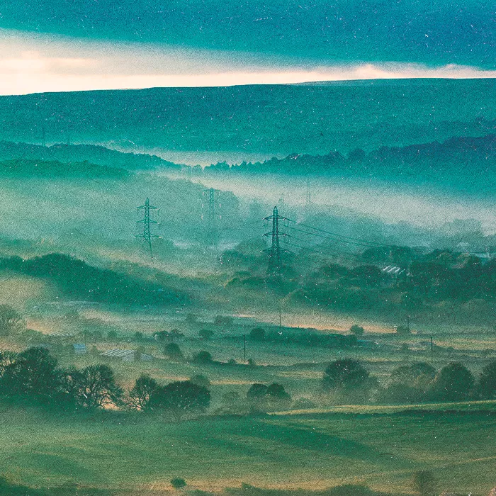 View of countryside in early morning light and haze